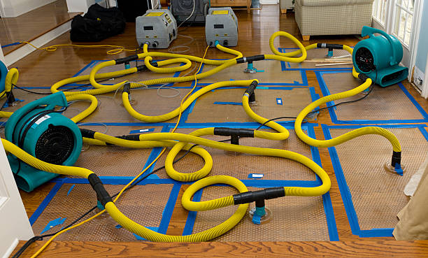 Professional Flood Damage Restoration technician working in Garfield, WA